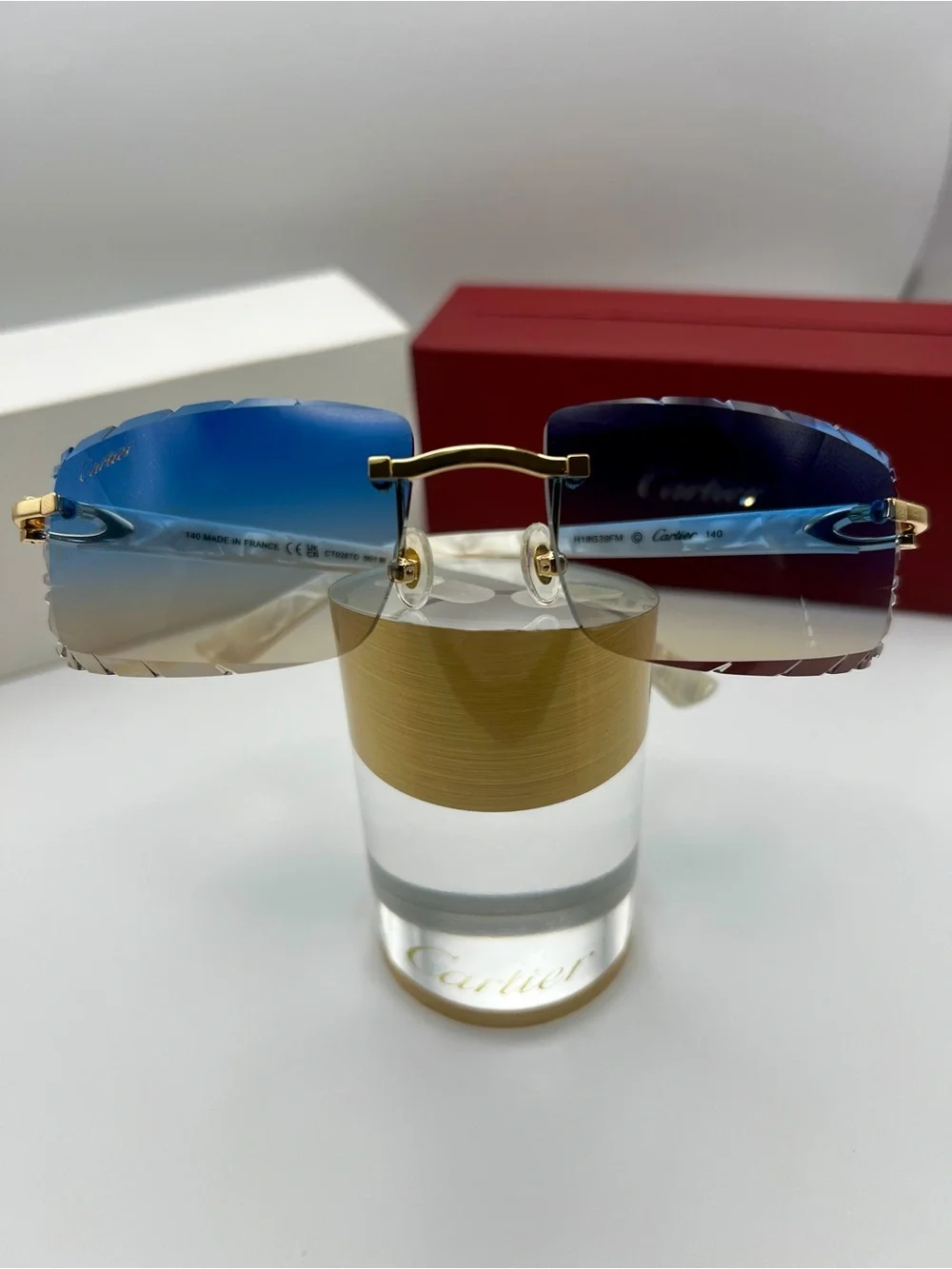 Cartier Blue Gradient Rimless Sunglasses with Gold and White Accents